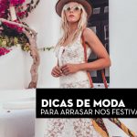 Mulher usando vestido branco com detalhes em renda, chapéu e óculos escuros, em ambiente ao ar livre.