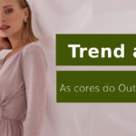 Mulher com vestido rosa claro, segurando o cabelo, ao lado de texto "Trend alert! As cores do Outono-Inverno".