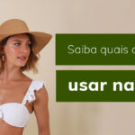 Mulher usando biquíni branco e chapéu, com texto "Saiba quais acessórios usar na praia".